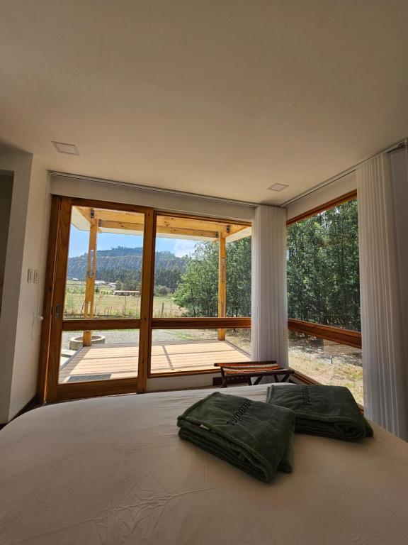 Postel nebo postele na pokoji v ubytování Casa del Oro