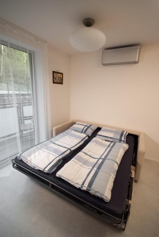 Postel nebo postele na pokoji v ubytování Apartmán víla Amálka