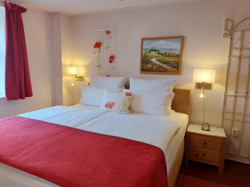 Postel nebo postele na pokoji v ubytování Logis L Auberge Gutshof