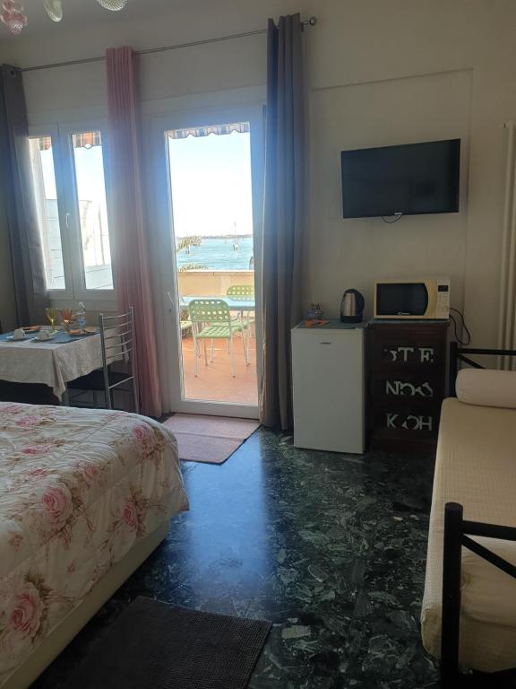 Postel nebo postele na pokoji v ubytování Casa Sulla Laguna