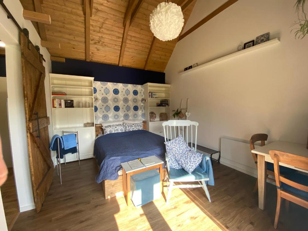 Postel nebo postele na pokoji v ubytování B&B by Mo