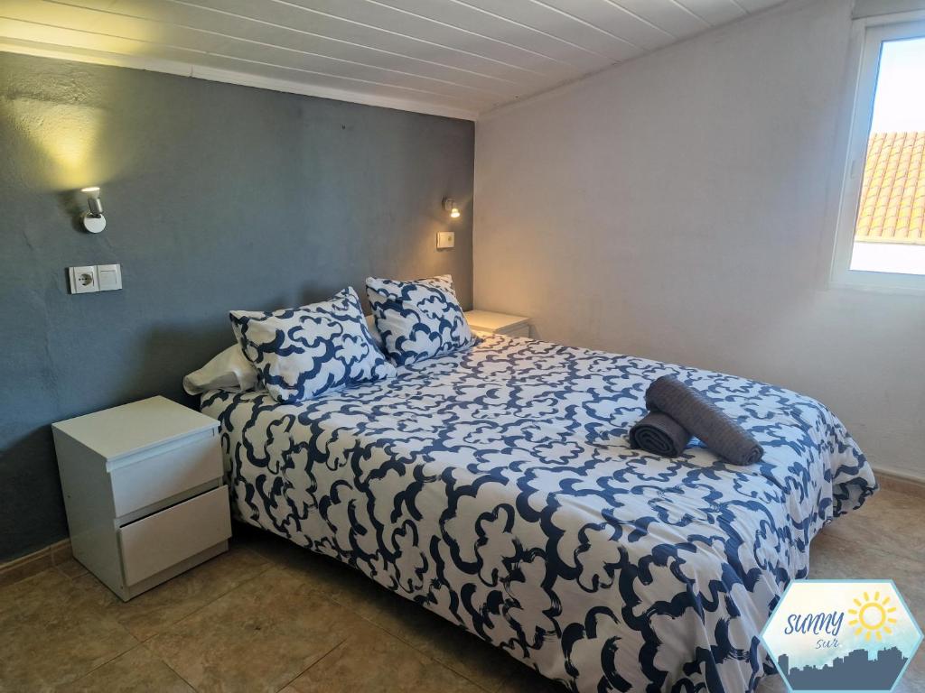 A bed or beds in a room at Sunny Churriana Airport III
