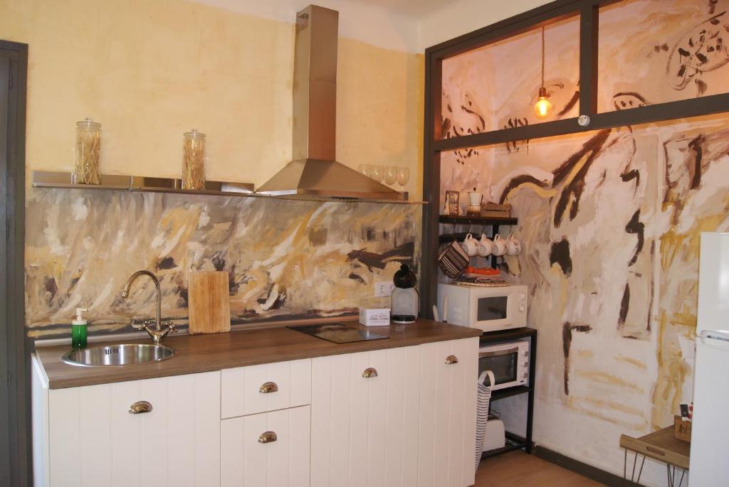 Kuchyňa alebo kuchynka v ubytovaní Apartamento con encanto l'Estany 2