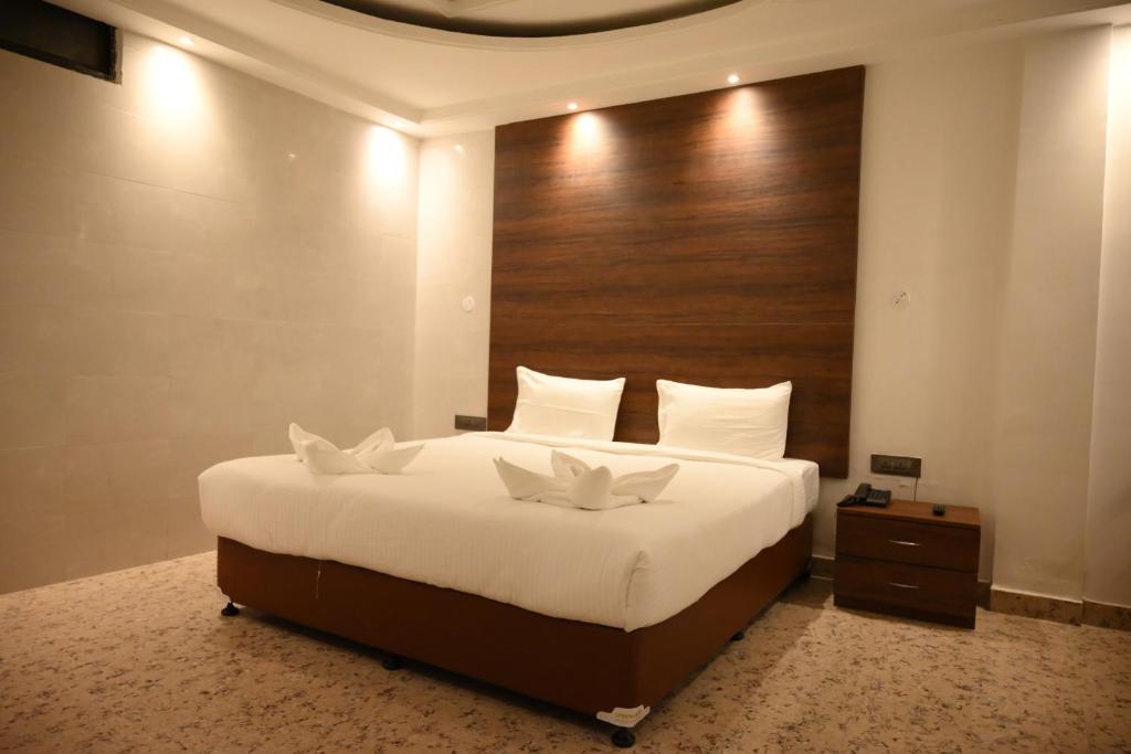 מיטה או מיטות בחדר ב-The Destination Resort