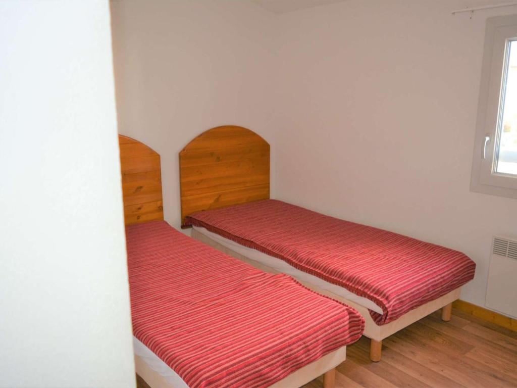 Una cama o camas en una habitaci&oacute;n de Maison Vallon-Pont-d&#39;Arc, 3 pi&egrave;ces, 6 personnes - FR-1-382-167