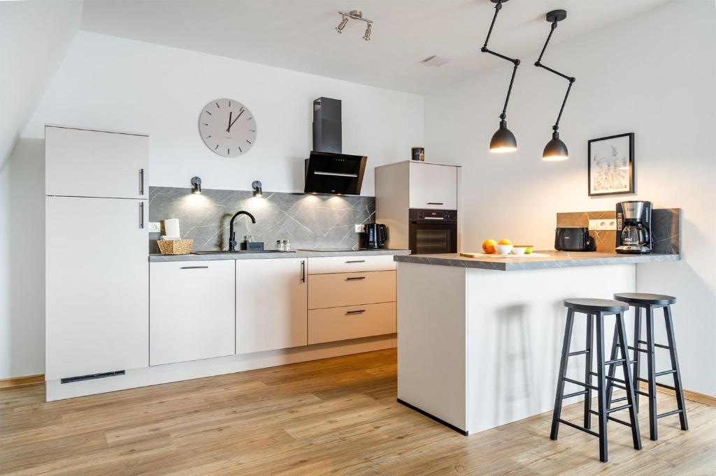 A cozinha ou cozinha compacta de Penthouse Wohnung 3punkt2