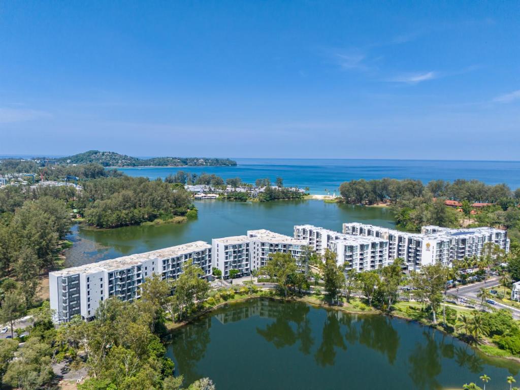 an aerial view of a resort on a lake at Laguna cassia residences in Bang Tao Beach