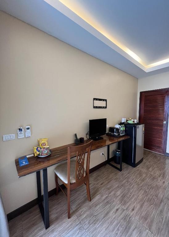 Kuchyň nebo kuchyňský kout v ubytování Ginis Beach Resort