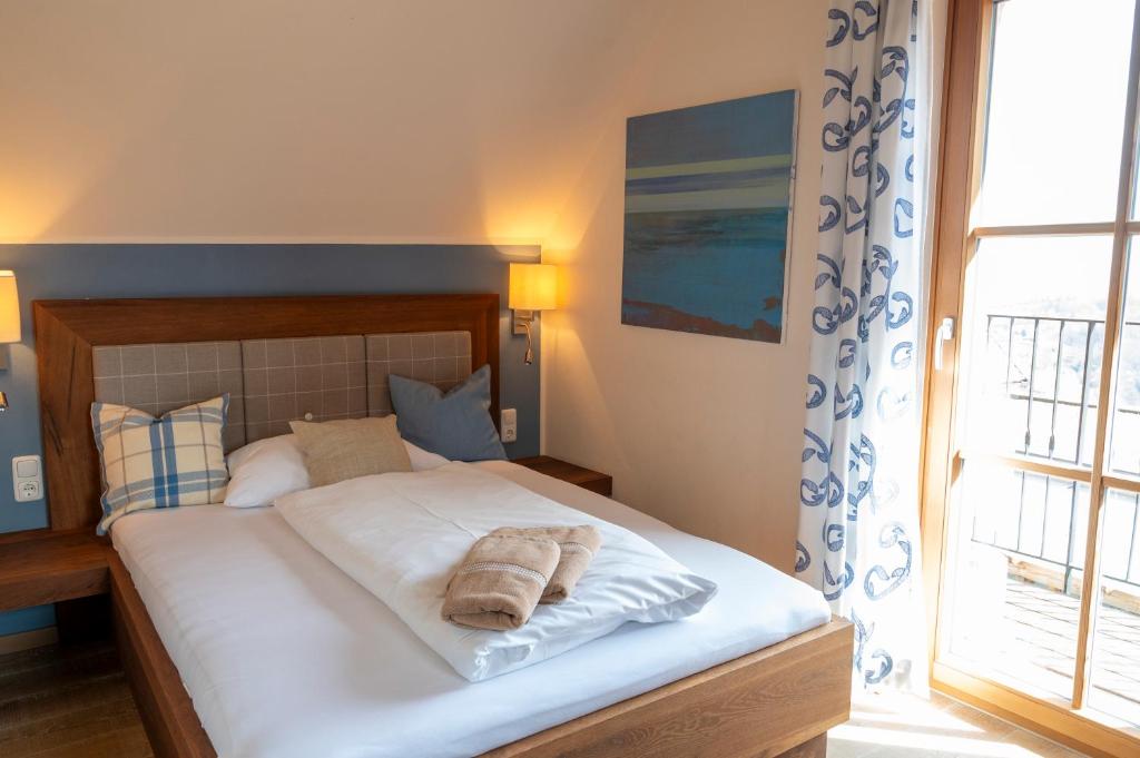 Postel nebo postele na pokoji v ubytování Winzerzimmer Scharl