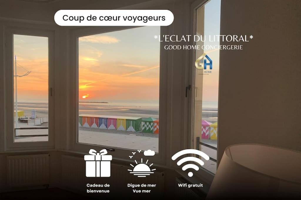 a room with a window with a view of the ocean at l'Éclat du Littoral Vue mer - Good Home in Dunkerque