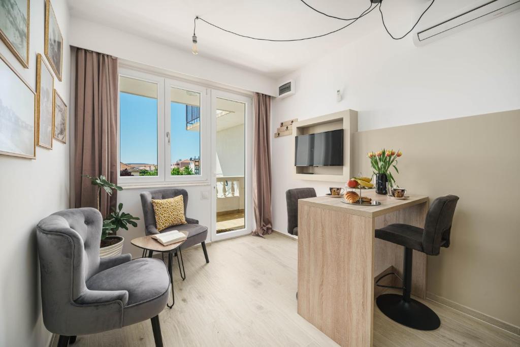 Телевизор и/или развлекательный центр в Apartment Remy