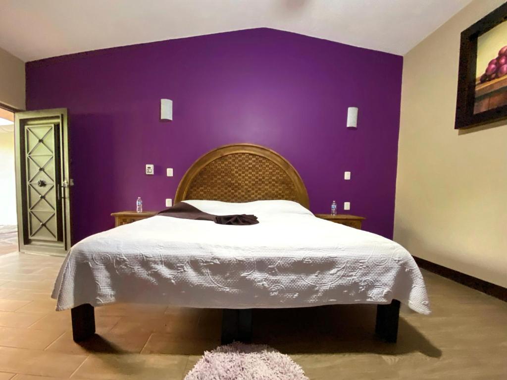 Postel nebo postele na pokoji v ubytování Frutos Hotel