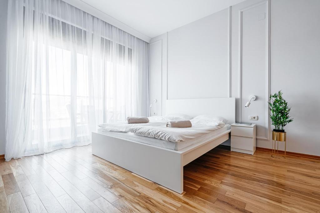 Postel nebo postele na pokoji v ubytování Przno Apartments by In Property