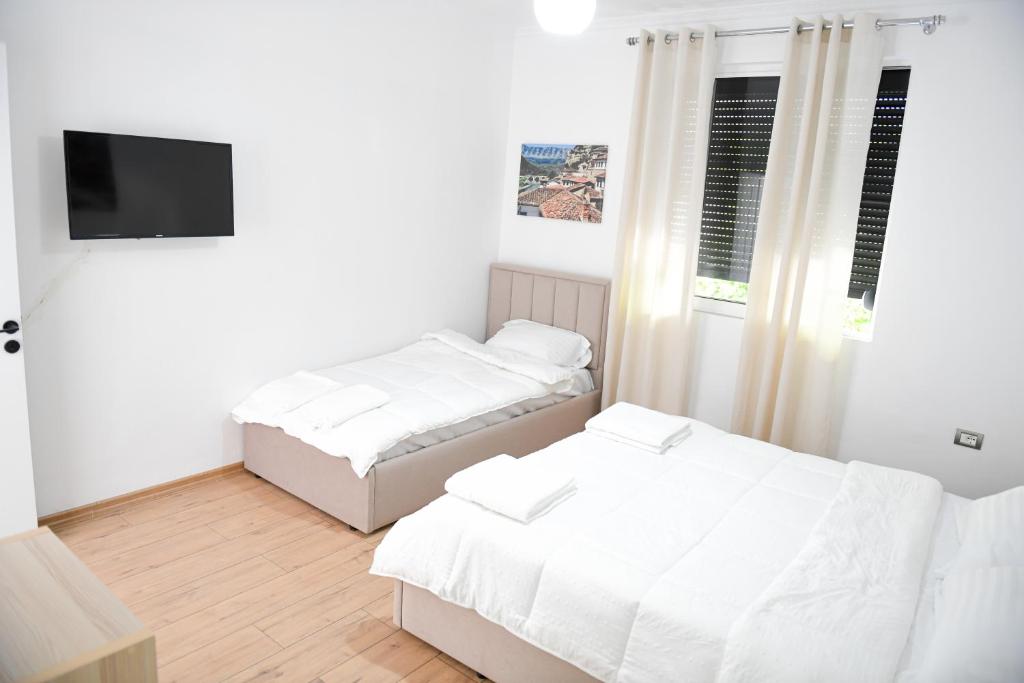 Postel nebo postele na pokoji v ubytování Hotel Villa Edis