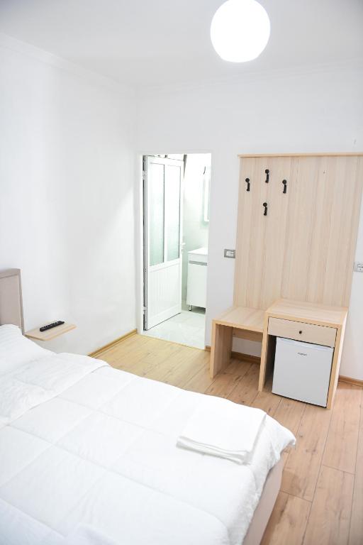 Postel nebo postele na pokoji v ubytování Hotel Villa Edis