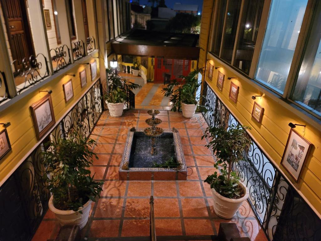 an overhead view of a building with a fountain at Pura Vida Dream in San José