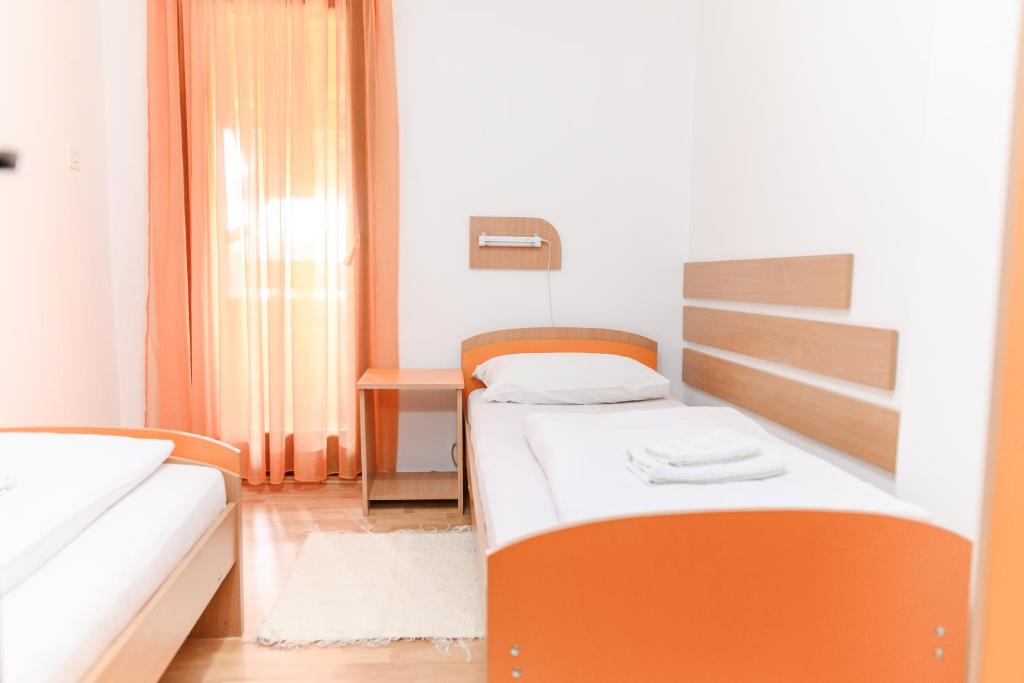 Letto o letti in una camera di Apartmani Zvirac