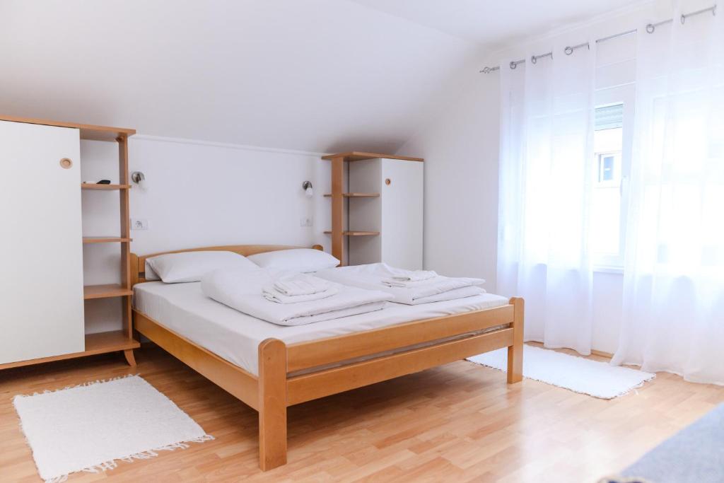 Letto o letti in una camera di Apartmani Zvirac