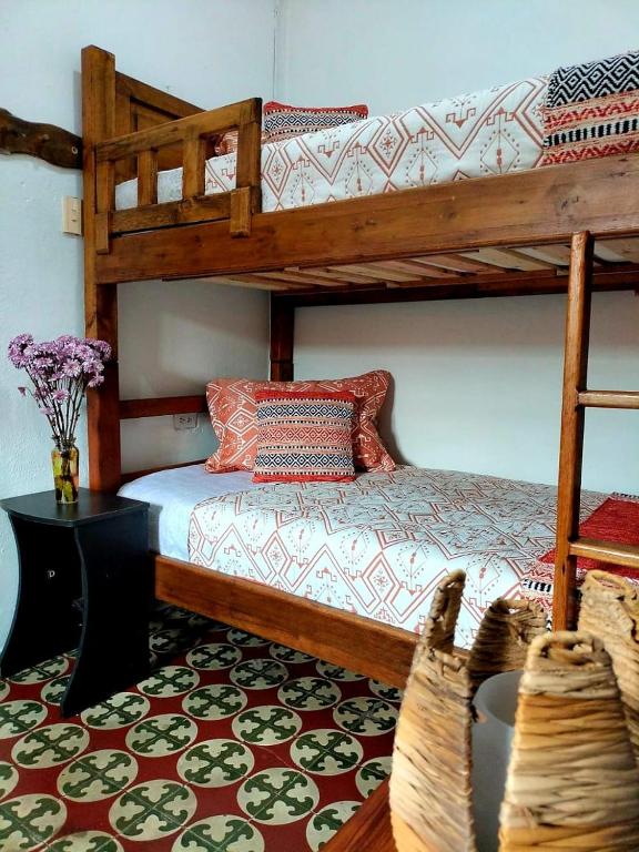 Postel nebo postele na pokoji v ubytování Hotel Posada Turística la Ceiba
