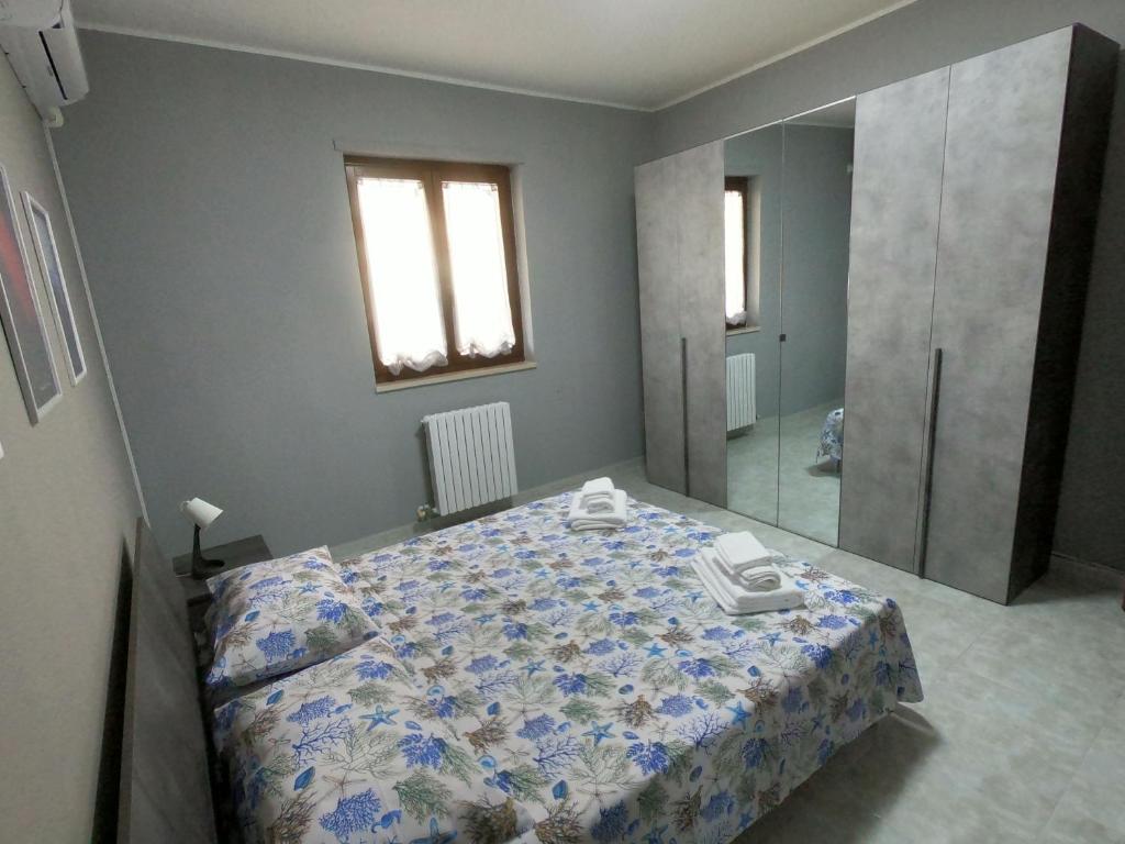 Postel nebo postele na pokoji v ubytování ScarpiHouse