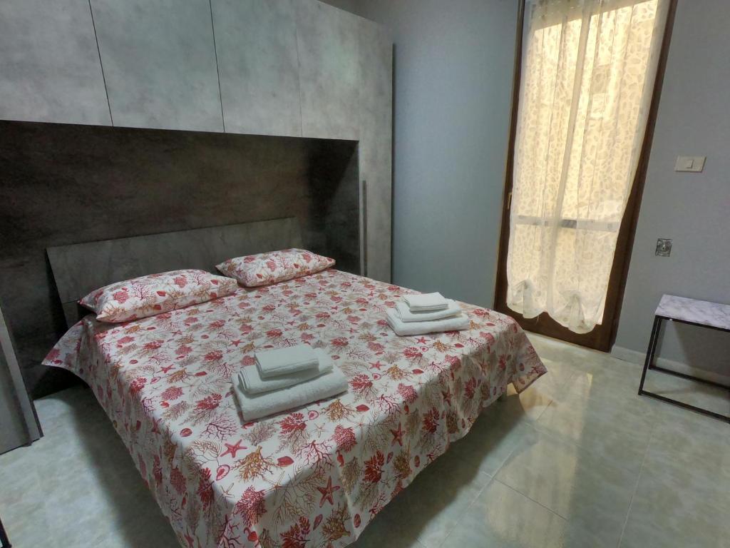 Postel nebo postele na pokoji v ubytování ScarpiHouse