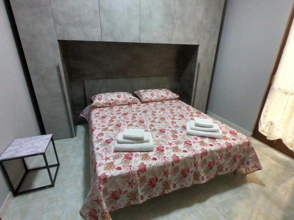 Postel nebo postele na pokoji v ubytování ScarpiHouse
