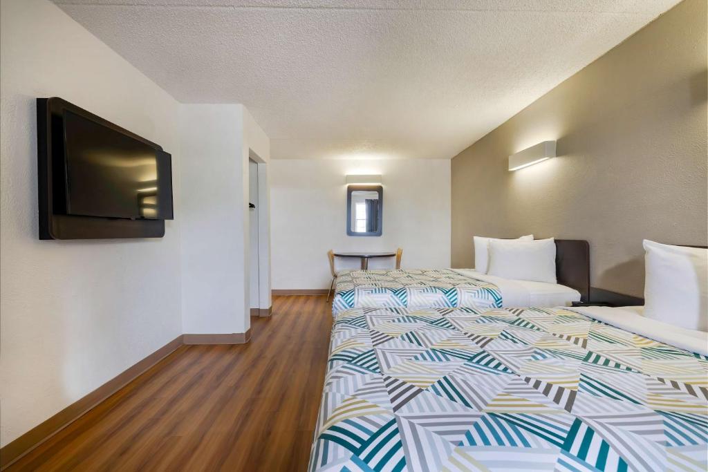 Postel nebo postele na pokoji v ubytování Motel 6-Beaumont, TX