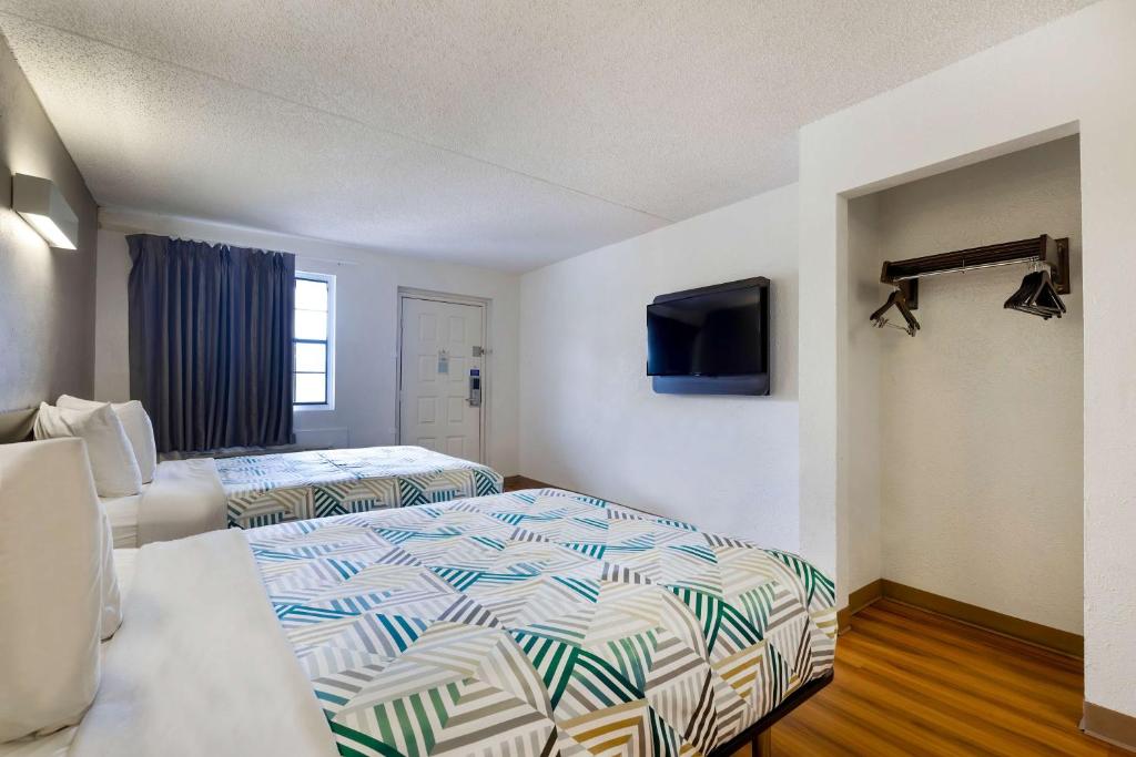 Postel nebo postele na pokoji v ubytování Motel 6-Beaumont, TX