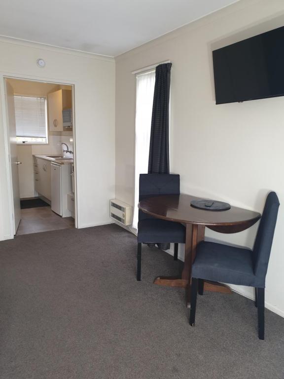 Kuchyň nebo kuchyňský kout v ubytování Northcote Motor Lodge