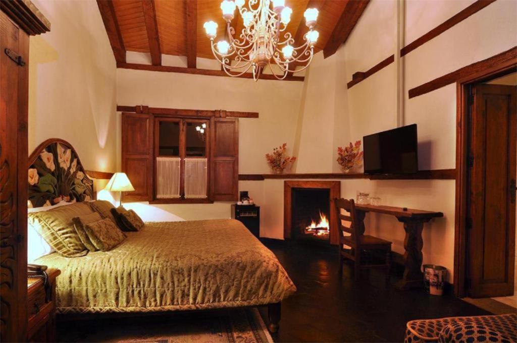 TV a/nebo společenská místnost v ubytování Mansion de los Sueños