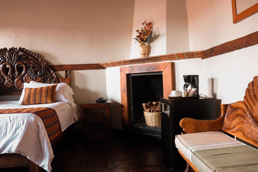 Postel nebo postele na pokoji v ubytování Mansion de los Sueños