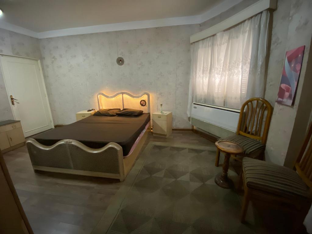 Postel nebo postele na pokoji v ubytování Mahitab music