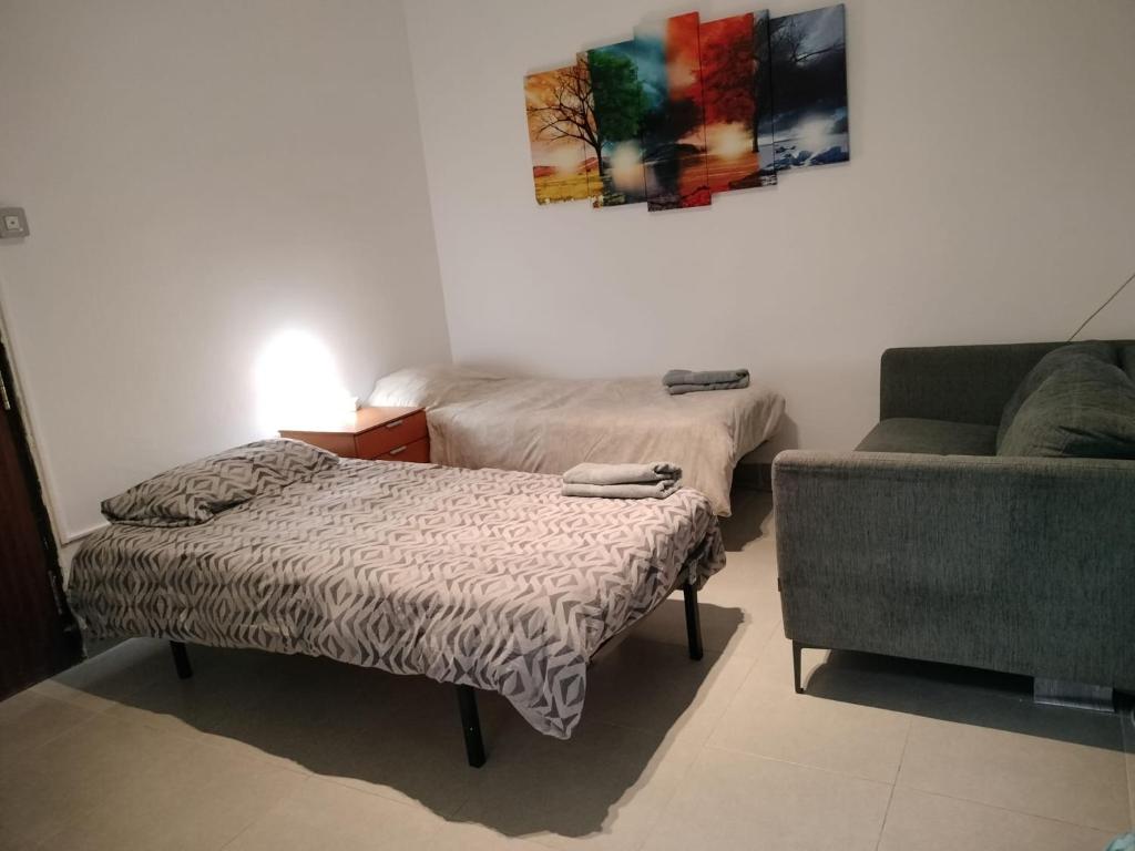 Cama o camas de una habitación en Rapha