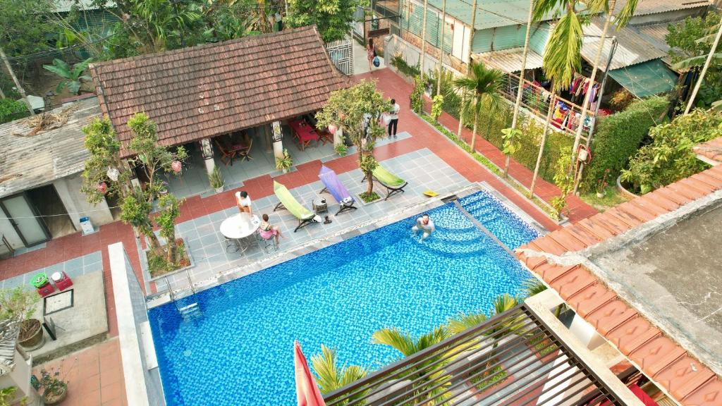 Tropical Valley Homestay - Villas - 19