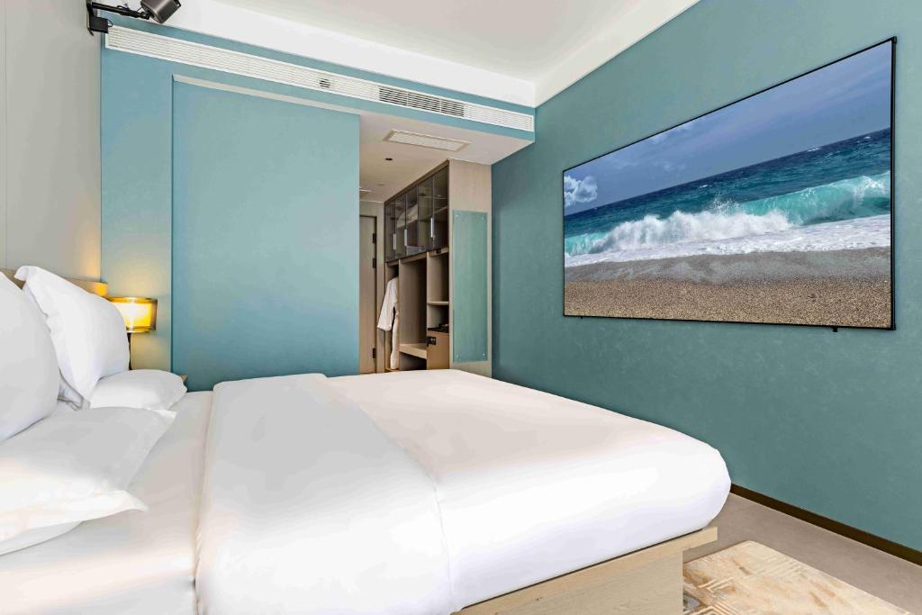 Letto o letti in una camera di Kunming Yuxi Hotel