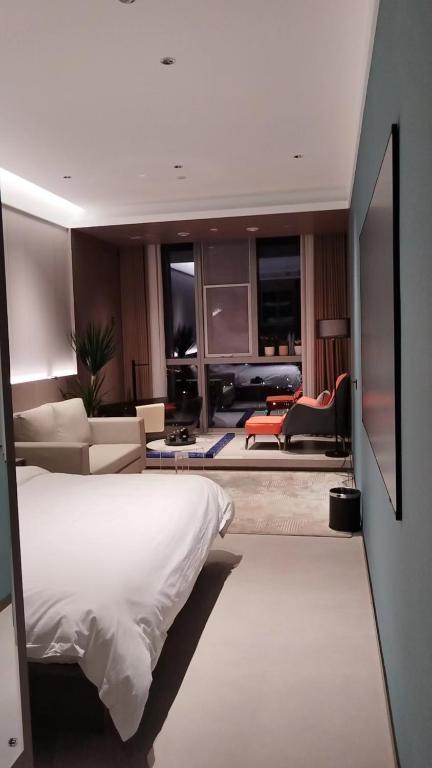 Letto o letti in una camera di Kunming Yuxi Hotel