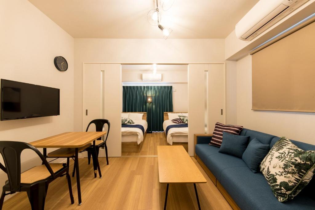 SG RESIDENCE INN HAKATAにあるテレビまたはエンターテインメントセンター