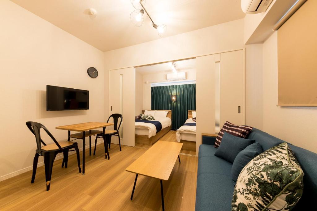 SG RESIDENCE INN HAKATAにあるテレビまたはエンターテインメントセンター