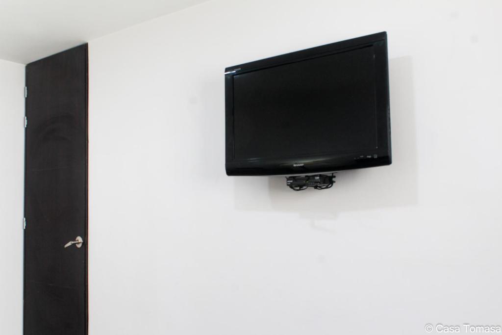 TV a/nebo společenská místnost v ubytování Casa Tomasa