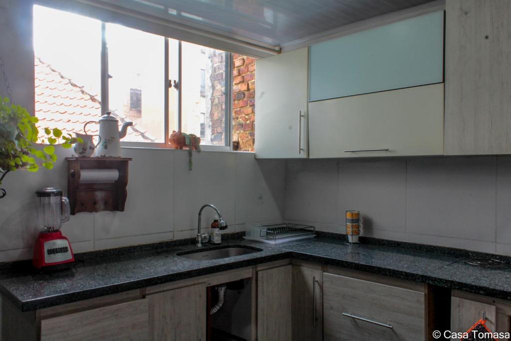 Kuchyň nebo kuchyňský kout v ubytování Casa Tomasa