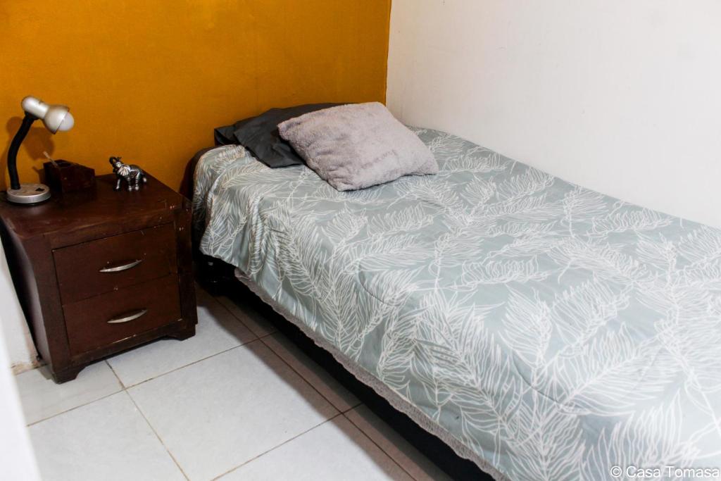 Postel nebo postele na pokoji v ubytování Casa Tomasa
