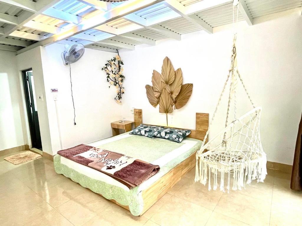 A bed or beds in a room at Lake view homestay