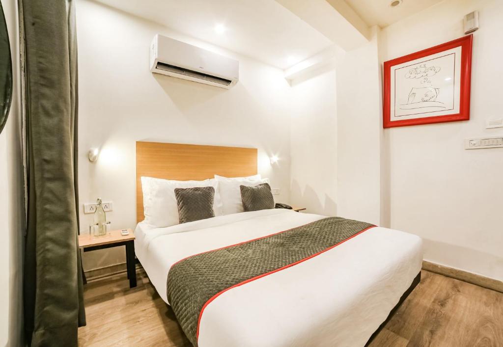 Postel nebo postele na pokoji v ubytování Super Hotel O Nawada Metro
