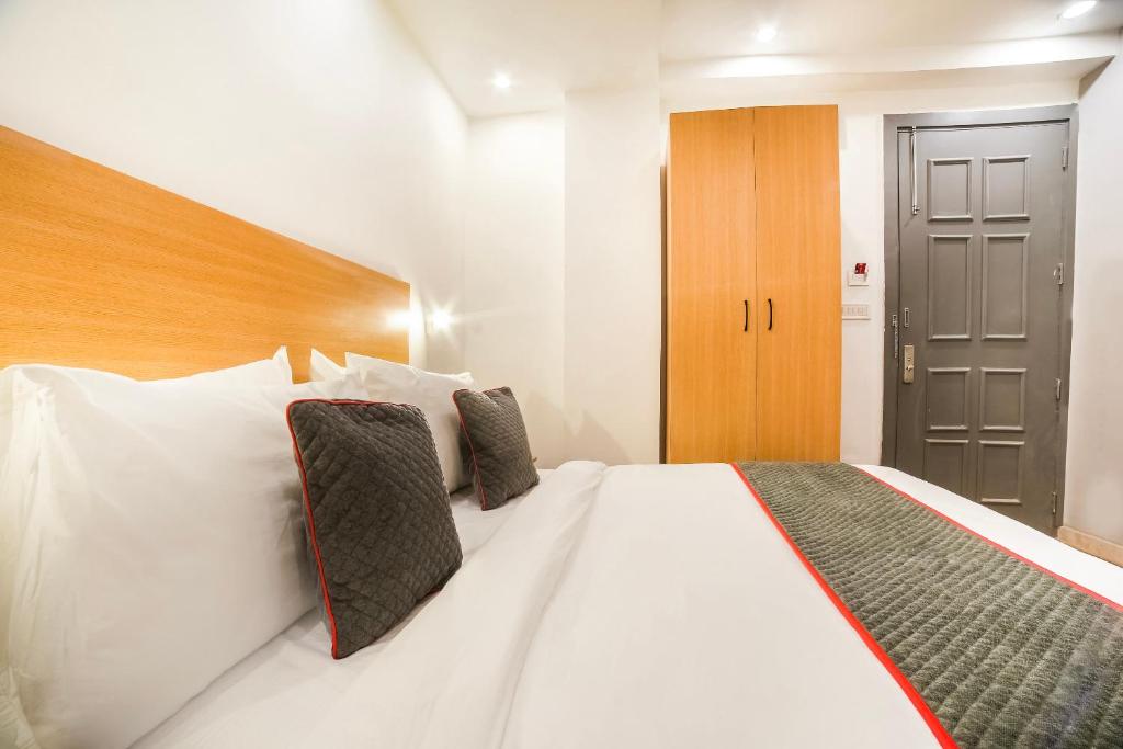 Postel nebo postele na pokoji v ubytování Super Hotel O Nawada Metro