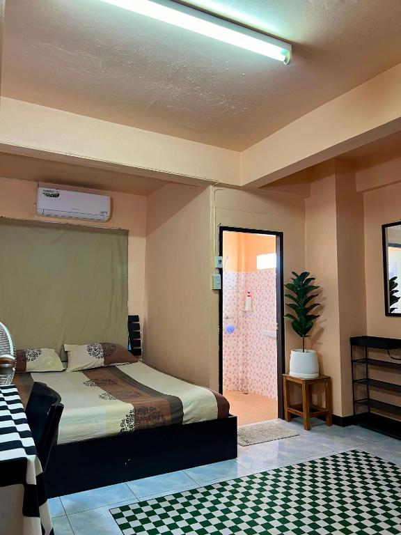 Postel nebo postele na pokoji v ubytování Karma Home Hostel