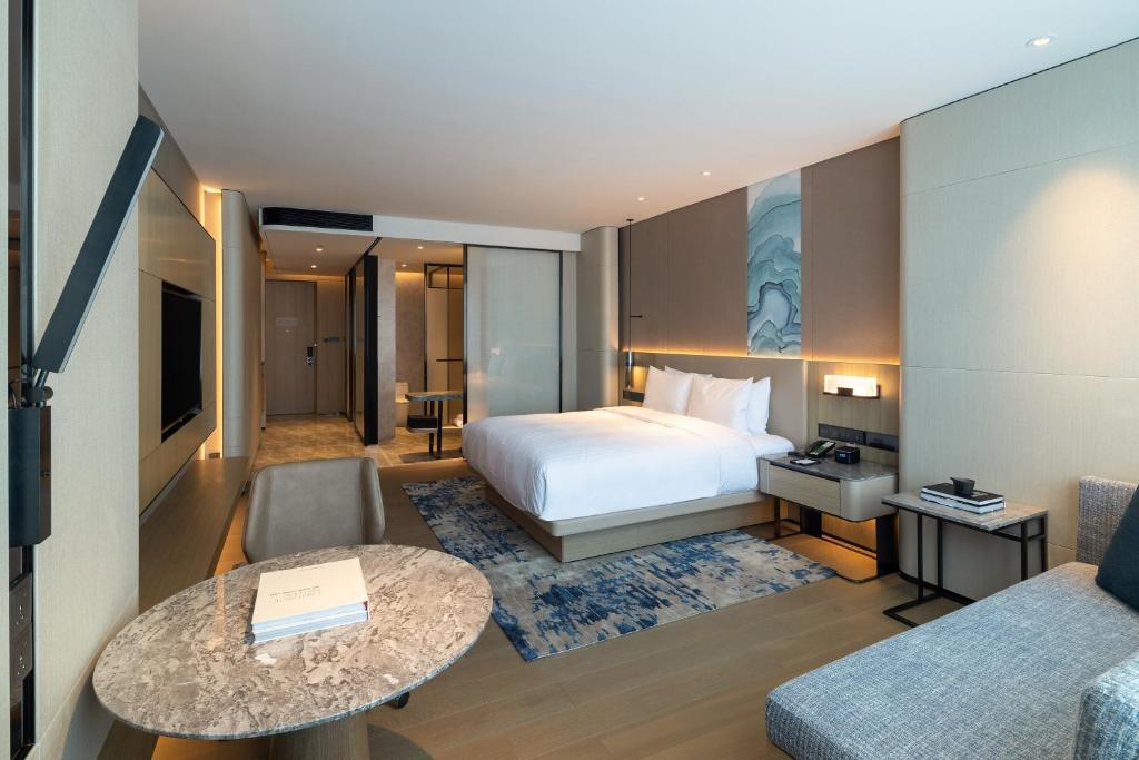 Postel nebo postele na pokoji v ubytování Courtyard by Marriott Shenzhen Northwest