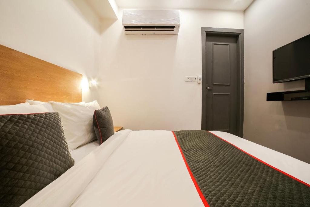 Postel nebo postele na pokoji v ubytování Super Hotel O Nawada Metro