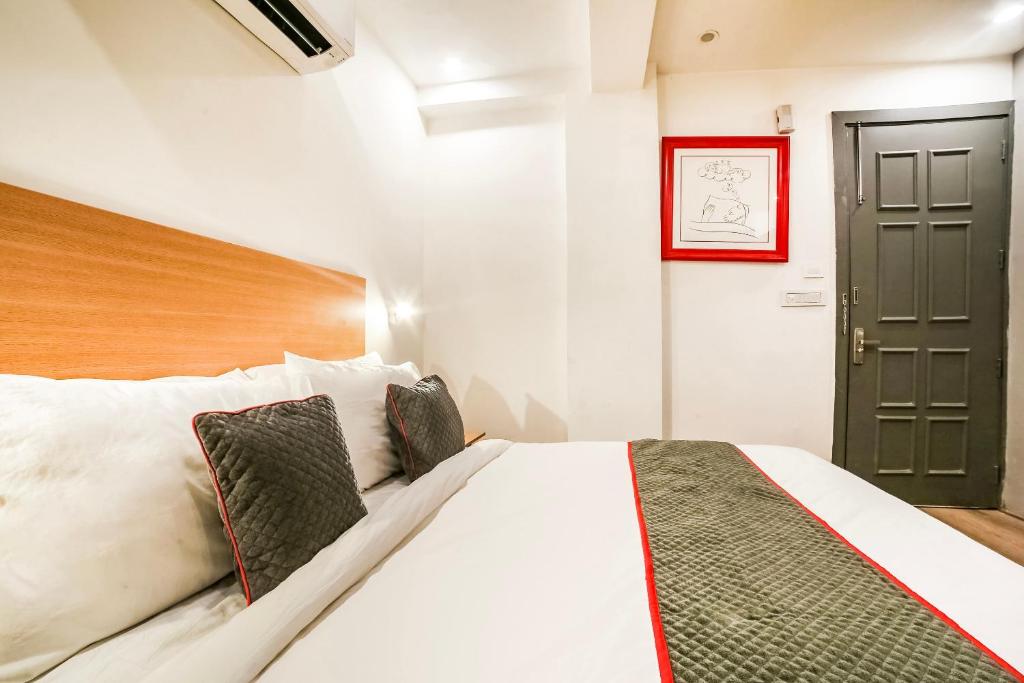 Postel nebo postele na pokoji v ubytování Super Hotel O Nawada Metro