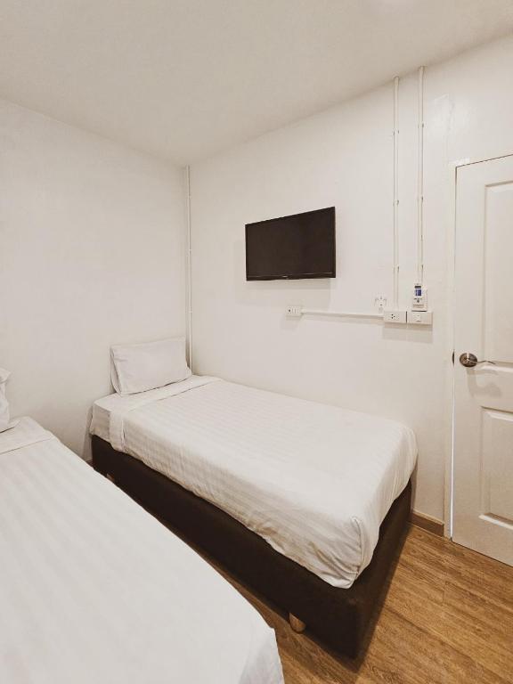 Postel nebo postele na pokoji v ubytování Casa Maya House