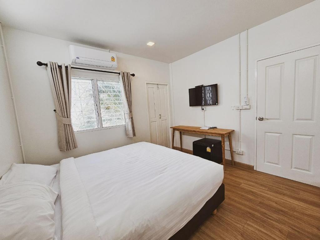 Postel nebo postele na pokoji v ubytování Casa Maya House